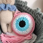 δώρο για νεογέννητο κορίτσι πλεκτό ματάκι ροζ χειροποίητο οικονομικό δώρο για μωρό